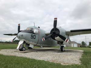Three quarters view of the C-1A Trader transport plane.