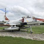 Side view of the TA-4J Skyhawk in its red coloring