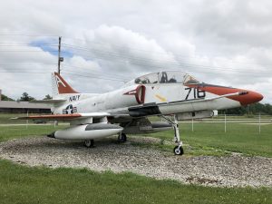 Side view of the TA-4J Skyhawk in its red coloring
