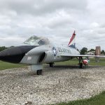 Three quarters view of the TF-102A Delta Dagger with a red, white, and blue tail