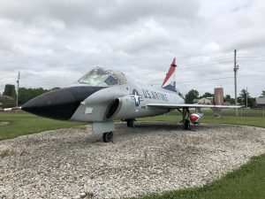 Three quarters view of the TF-102A Delta Dagger with a red, white, and blue tail