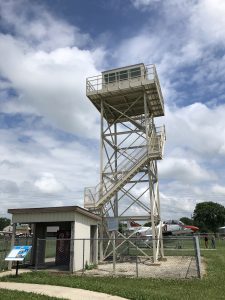 A picture from the ground of a Grissom AFB guard tower. Also shows the entry shed and interpretation sign.