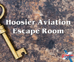 Marble Background with a golden key and the words "Hoosier Aviation Escape Room" overlaid