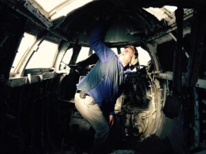 A volunteer cleans the inside of one of the planes.